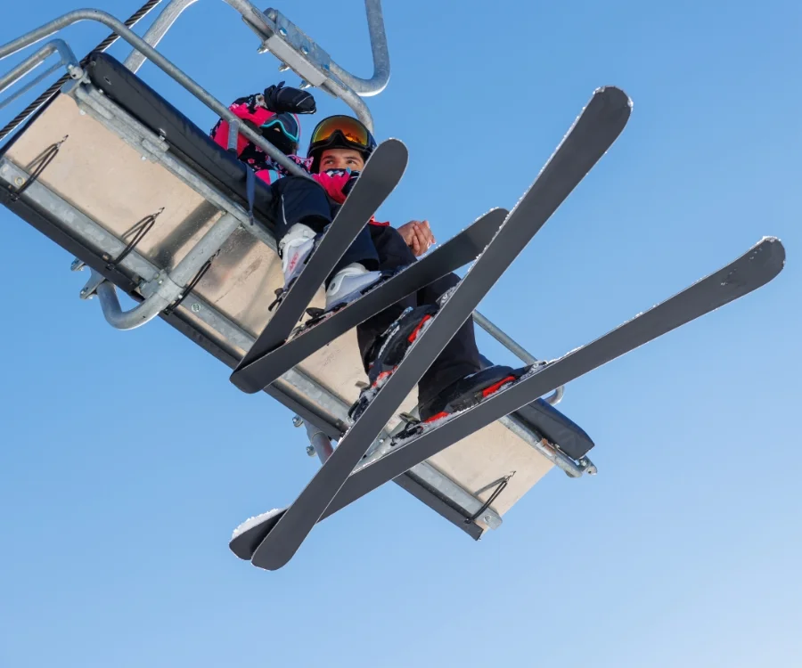 father and child on chairlift